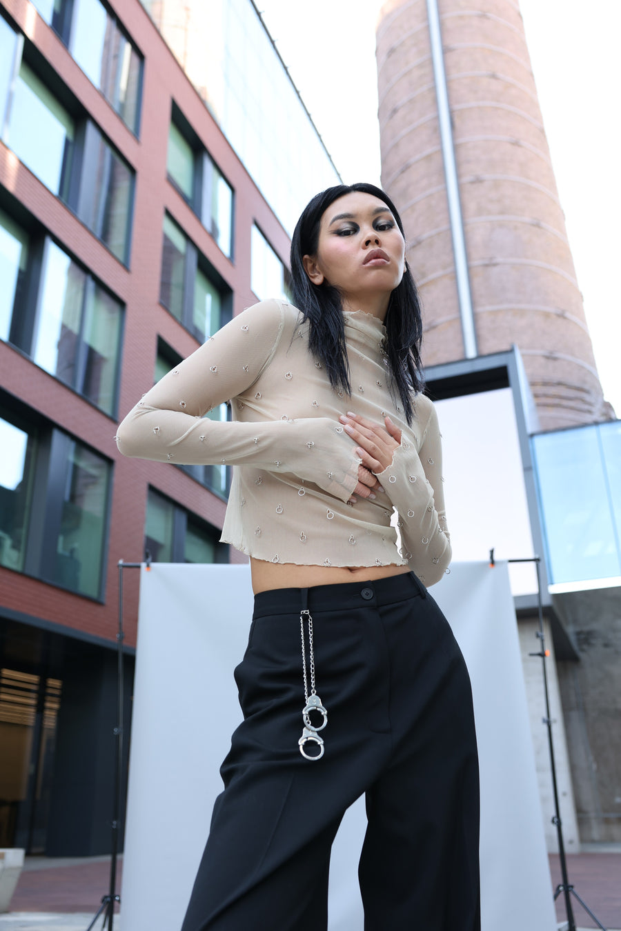 TOP WITH METAL RINGS