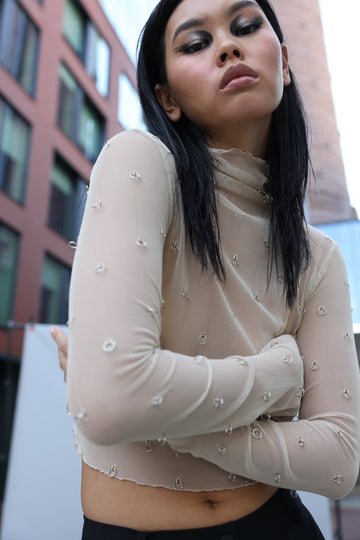 TOP WITH METAL RINGS